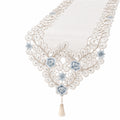 Chemin de table en dentelle avec broderie florale bleu et franges